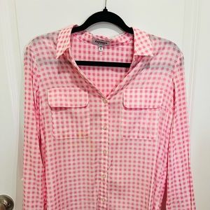 Long sleeve pink shirt.